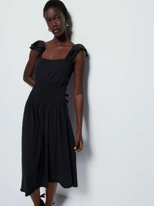 Midi dresses with keyhole backs for a flirty and unexpected detail Brittini Dress