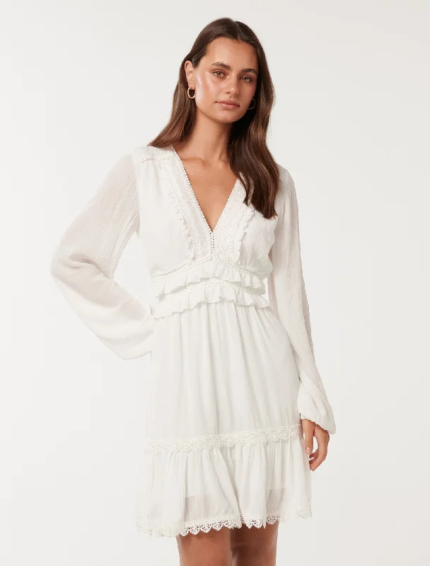  Elsa Trim High Low Mini Dress