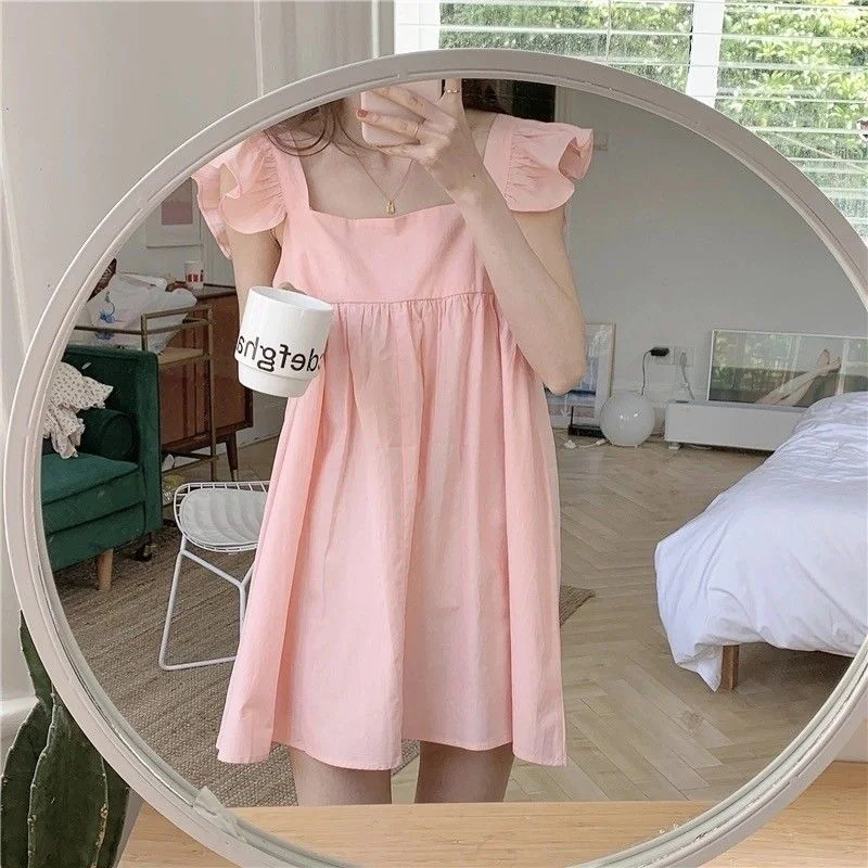 Denim mini dresses with distressed details KittenAlarm - Issy Pocketed Ruffle Babydoll Dress - Coral - FINAL SALE Denim mini dresses with distressed details KittenAlarm - Issy Pocketed Ruffle Babydoll Dress - Coral - FINAL SALE