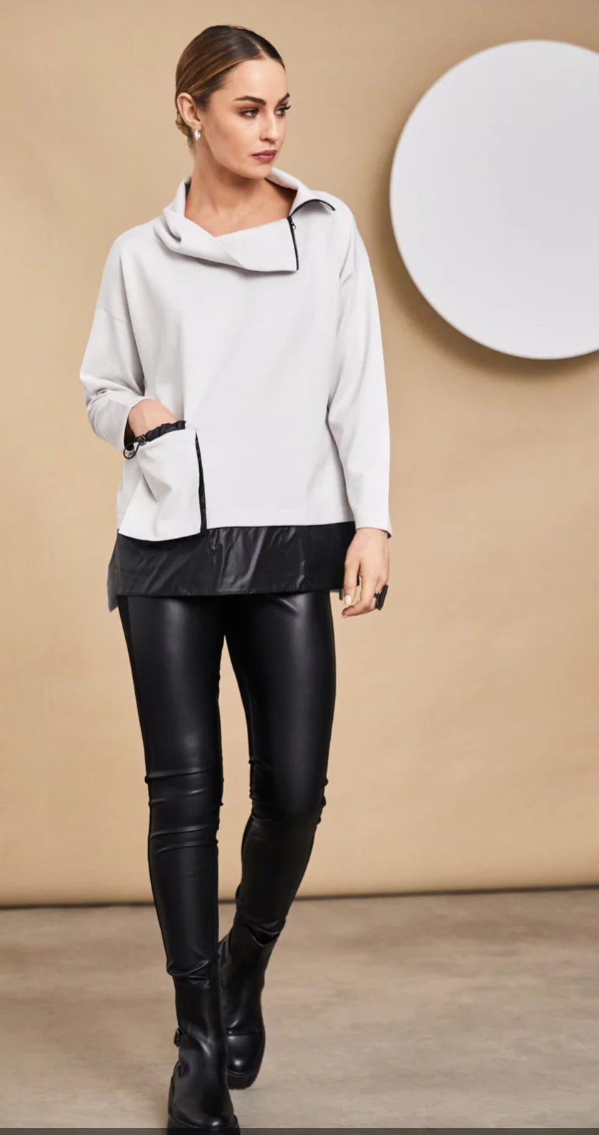 Plus Size Women's Mock - Neck Sweater in Teal with a Side Slit for a Modern TwistNaya Sand High Neck Top With Pocket And Contrast Hemband Plus Size Women's Mock - Neck Sweater in Teal with a Side Slit for a Modern TwistNaya Sand High Neck Top With Pocket And Contrast Hemband