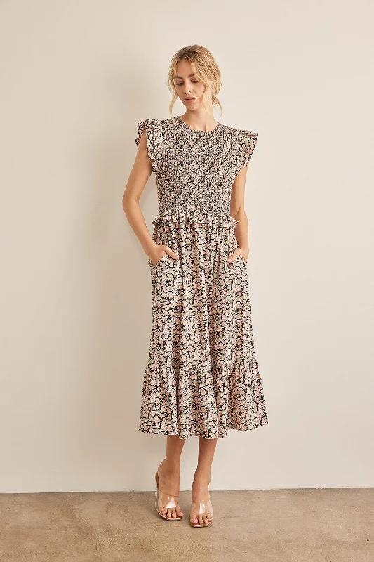 Midi dresses with puff sleeves for a vintage - inspired lookIn February Floral Smocked Ruffled Midi Dress Midi dresses with puff sleeves for a vintage - inspired lookIn February Floral Smocked Ruffled Midi Dress