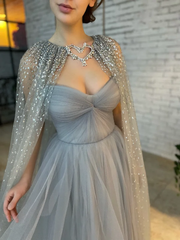 Midi dresses with ruched sleeves for a more fitted and stylish arm lookSilver Lining Capelet Dress Midi dresses with ruched sleeves for a more fitted and stylish arm lookSilver Lining Capelet Dress