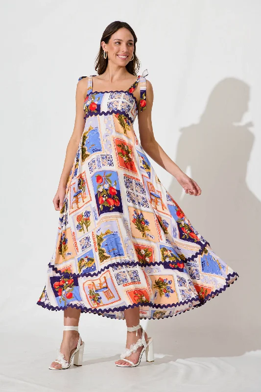 Sleeveless maxi dresses in silk for a sophisticated summer weddingSomerset Maxi Sundress In White Multi Postcard Ric Rac Trim Sleeveless maxi dresses in silk for a sophisticated summer weddingSomerset Maxi Sundress In White Multi Postcard Ric Rac Trim