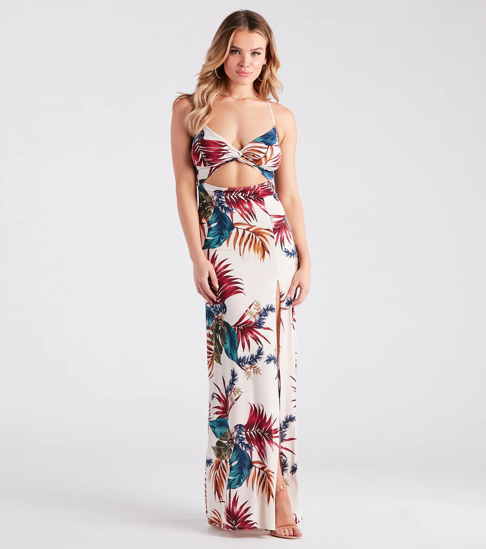 Maxi dresses with tiered ruffled sleeves and a-line silhouettes for a feminine and voluminous lookVacation Awaits Tropical Print Cutout Maxi Dress Maxi dresses with tiered ruffled sleeves and a-line silhouettes for a feminine and voluminous lookVacation Awaits Tropical Print Cutout Maxi Dress