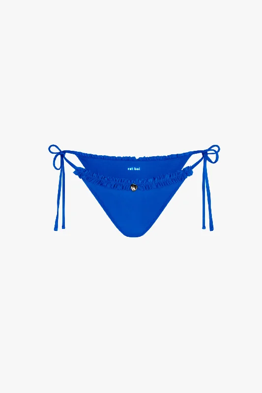 Tie - side bikini bottoms for an adjustable and stylish fitRUFFLE CHARM BIKINI BOTTOM IN ULTRAMARINE Tie - side bikini bottoms for an adjustable and stylish fitRUFFLE CHARM BIKINI BOTTOM IN ULTRAMARINE